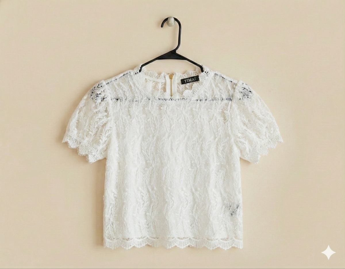 Blusa de encaje con cierre en la espalda