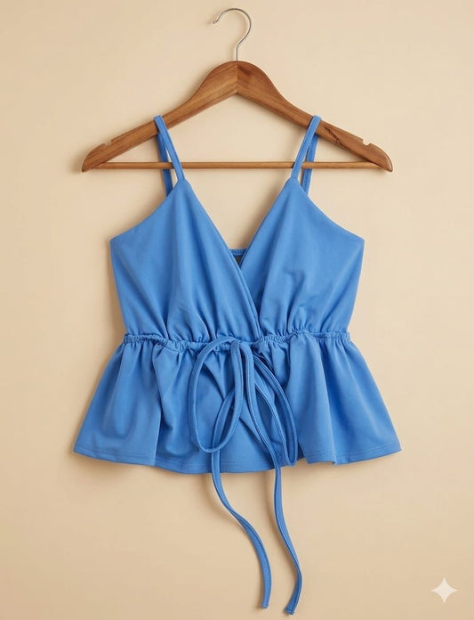Blusa tipo vaquera de tirante y resorte en la cintura