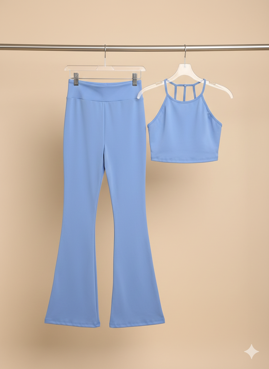 Set deportivo, leggins con bolsas y top con detalle